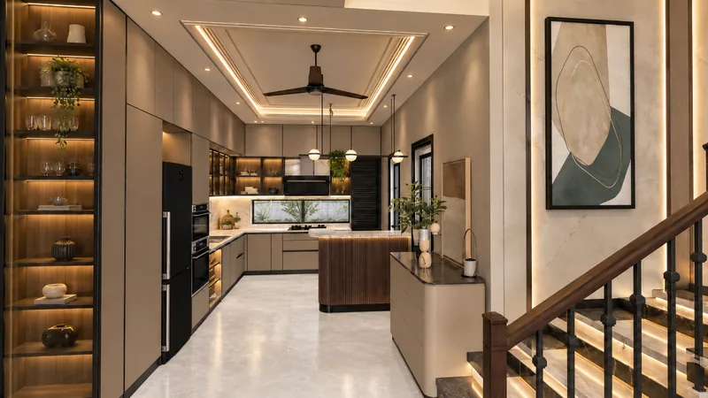 Second view of the same modular kitchen, showing the island, built-in appliances and lit open shelving beside the staircase